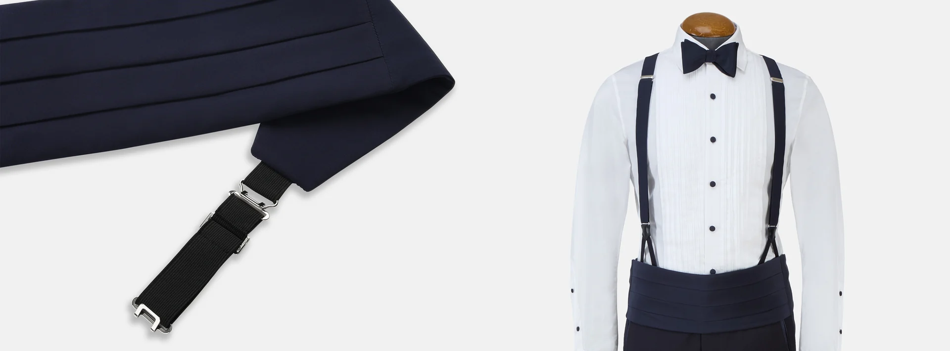 Dark cummerbund beside a dress shirt, braces, and bow tie