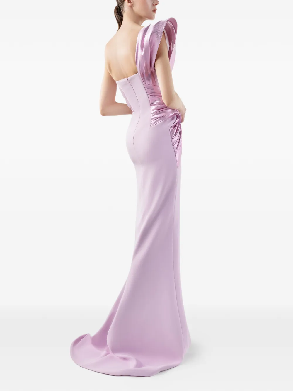Back view of a lilac one-shoulder evening gown with a flowing train